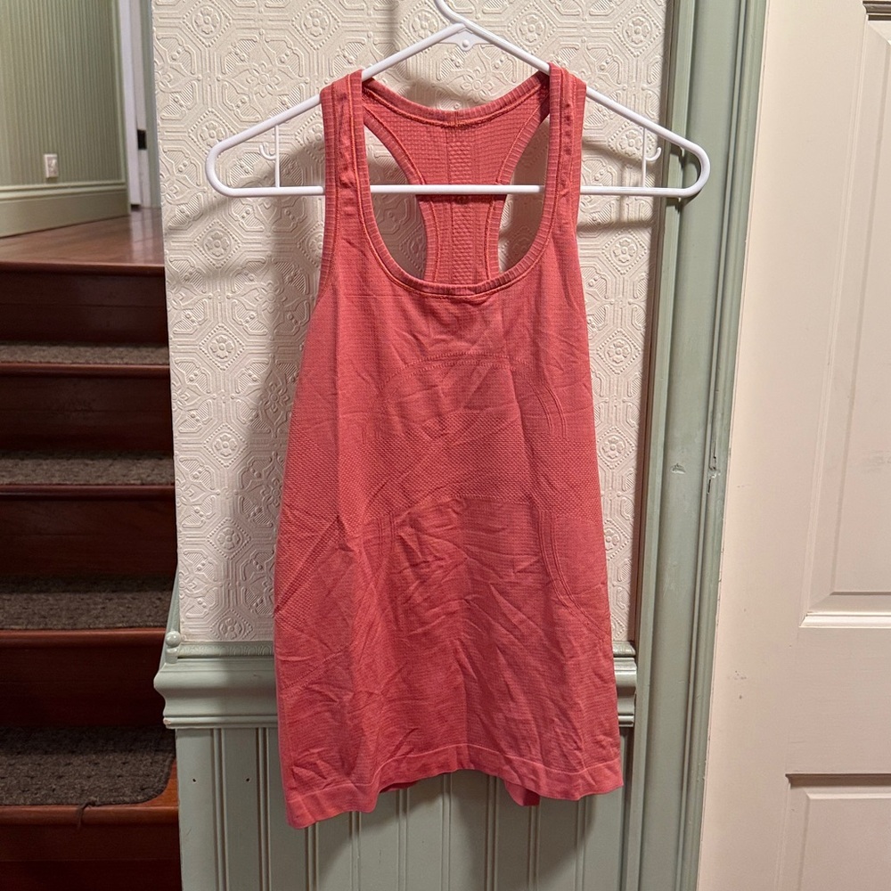 Lululemon Swiftly Tech Racerback Tank. Hip length.